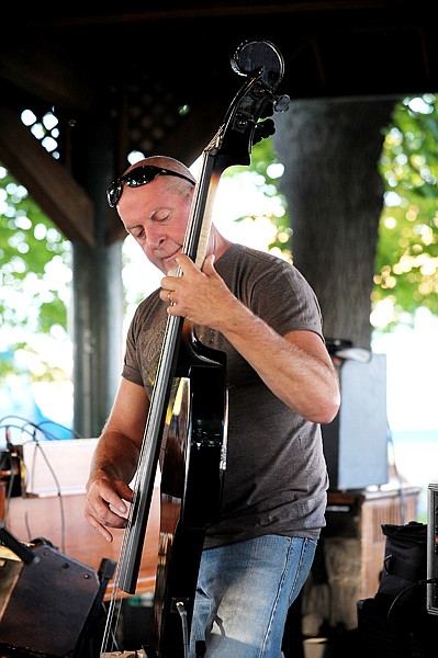 <p>Ron Reeves of Mood Iguana playing with Andre Floyd at Picnic in the Park on Thursday, August 7, in Kalispell.</p>