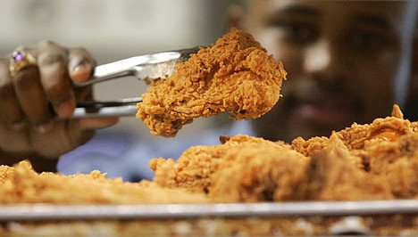 &lt;p&gt;FILE - In this Monday, Oct. 30, 2006 file photo, a Kentucky Fried Chicken employee uses tongs to hold up an sample of the company's trans fat-free Extra Crispy fried chicken in New York. New York City now has hard evidence that its ban on trans fat in restaurant food made a meaningful dent in people's consumption of the artery clogger and wasn't just replaced with another bad fat. The findings being published Tuesday, July 16, 2012 have implications beyond heart health, suggesting another strategy to curb the nation's obesity epidemic fueled by a high-calorie, super-sized environment. (AP Photo/Kathy Willens, File)&lt;/p&gt;