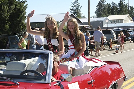 &lt;p&gt;Athol little miss queen Chantelle Lickfold, 12, left, and Athol little miss princess Kylee Amos, 11, wave to the crowd during the Athol Daze parade Saturday.&lt;/p&gt;