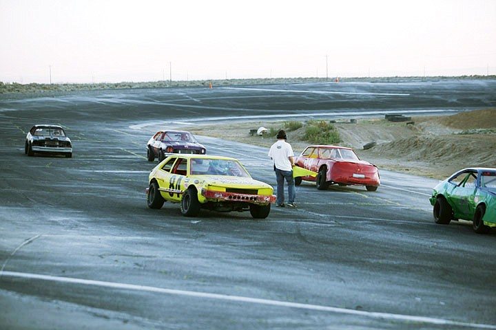 The action slows to a crawl following a spinout in turn two as cars are put back in the proper racing order.