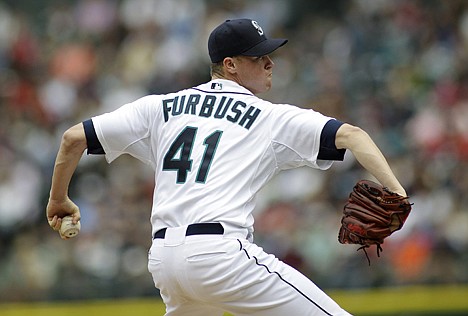 &lt;p&gt;Seattle starter Charlie Furbush delivers a pitch during the Mariners' win over Boston on Sunday in Seattle.&lt;/p&gt;