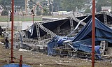 Strong wind topples stage at fair; five die
