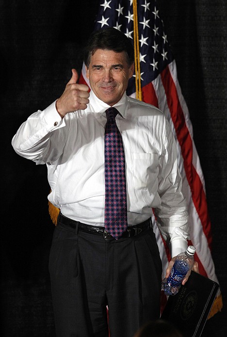 <p>Republican presidential candidate Texas Gov. Rick Perry attends the Black Hawk County Republican Party Lincoln Day Dinner on Sunday.</p>