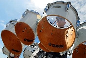 Bryce Puchta plays a set of tenor drums with the rest of the drum line during Glacier High School's Band Camp Tuesday afternoon. The band will perform in the Northwest Montana Fair parade on Friday. To listen to an audio slide show of the band camp, go to &lt;a href=&quot;http://www.dailyinterlake.com&quot;&gt;www.dailyinterlake.com&lt;/a&gt; Nate Chute photos/Daily Inter Lake