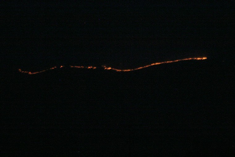 &lt;p&gt;The line of fire on the North ridge in Hot Springs set an orange glow against the night sky Tuesday, Aug. 14.&#160;&lt;/p&gt;