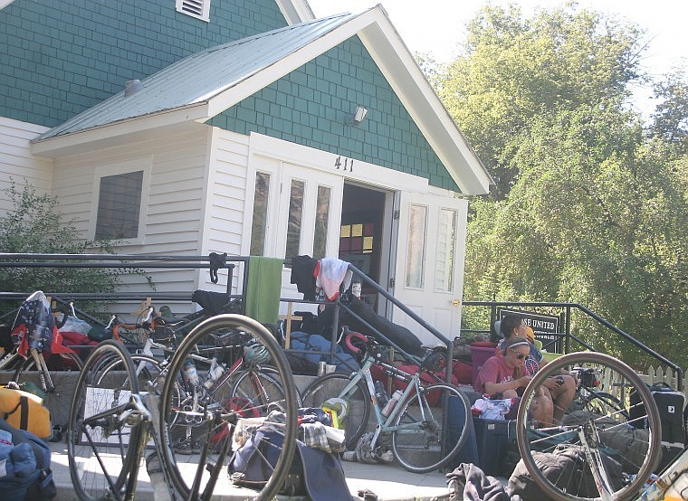 &lt;p&gt;Bike &amp; Build cyclists take a break on the steps of United Methodist Church, Paradise, Saturday afternoon after a long day of riding. The church hosted the group of 30 and provided to them food and shelter for the night.&lt;/p&gt;