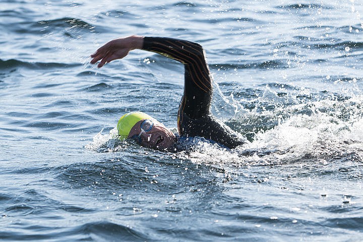 &lt;p&gt;Robby Jones swims across Lake Coeur d&#146;Alene during the Coeur d&#146;Alene Crossing Sunday morning.&lt;/p&gt;