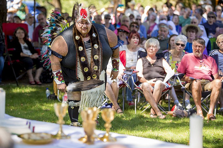 &lt;p&gt;Dresssed in traditional regalia, Coeur d'Alene Tribal Member Andy Kitt performs a Cup Dance on Monday, Aug. 15, 2016 at the Tribe's 82nd annual Cataldo Pilgrimage mass at Old Mission State Park. The dance is performed before communion to honor the food from heaven. The Catholic mass celebrated the Feast of the Assumption of the Virgin Mary, and featured a coming together of the Catholic religion and Native American culture.&lt;/p&gt;