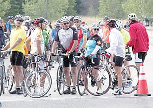 &lt;p&gt;Tour participants await the 8 a.m. start of the fourth annual Le Tour de Koocanusa atop the David Thompson Bridge below Libby Dam Saturday. In all there were 122 registered riders for this year's tour.&lt;/p&gt;
