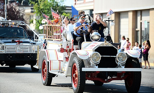 &lt;p&gt;West Valley Assistant Fire Chief Shawn Laughery, left, and firefighter Phil Gironda drive a 1917 Le France in the Northwest Montana Fair Parade. West Valley took first place in the Antique Car category.&lt;/p&gt;