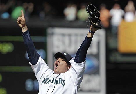 &lt;p&gt;Seattle Mariners pitcher Felix Hernandez celebrates after throwing a perfect game against the Tampa Bay Rays, in a baseball game Wednesday, Aug. 15, 2012, in Seattle. (AP Photo/Ted S. Warren)&lt;/p&gt;