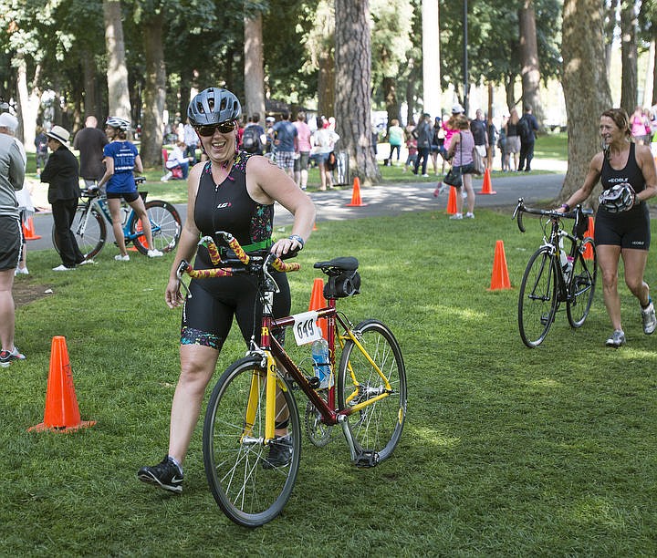 &lt;p&gt;BETHANY BLITZ/Press Athletes swim in the waters of Lake Coeur d'Alene, bike downtown and run along the Centennial Trail during the Coeur d'Alene Triathlon on Saturday, August 13, 2016.&lt;/p&gt;