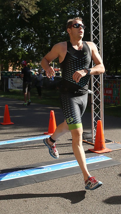 &lt;p&gt;LOREN BENOIT/Press Athletes swim in the waters of Lake Coeur d'Alene, bike downtown and run along the Centennial Trail during the Coeur d'Alene Triathlon on Saturday, August 13, 2016.&lt;/p&gt;