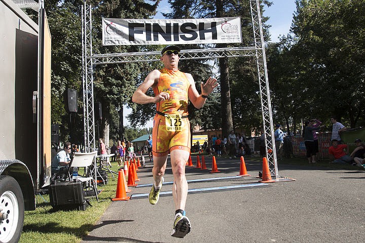 &lt;p&gt;BETHANY BLITZ/Press Athletes swim in the waters of Lake Coeur d'Alene, bike downtown and run along the Centennial Trail during the Coeur d'Alene Triathlon on Saturday, August 13, 2016.&lt;/p&gt;