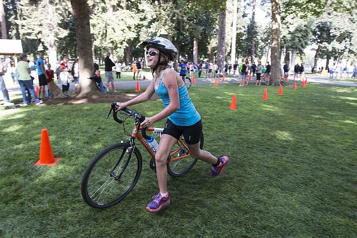 &lt;p&gt;BETHANY BLITZ/Press Athletes swim in the waters of Lake Coeur d'Alene, bike downtown and run along the Centennial Trail during the Coeur d'Alene Triathlon on Saturday, August 13, 2016.&lt;/p&gt;