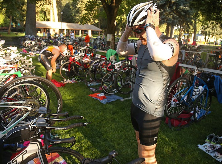 &lt;p&gt;LOREN BENOIT/Press Athletes swim in the waters of Lake Coeur d'Alene, bike downtown and run along the Centennial Trail during the Coeur d'Alene Triathlon on Saturday, August 13, 2016.&lt;/p&gt;