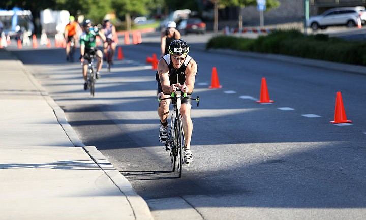 &lt;p&gt;LOREN BENOIT/Press Athletes swim in the waters of Lake Coeur d'Alene, bike downtown and run along the Centennial Trail during the Coeur d'Alene Triathlon on Saturday, August 13, 2016.&lt;/p&gt;