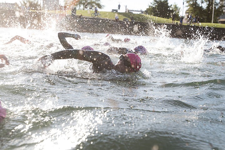 &lt;p&gt;BETHANY BLITZ/Press Athletes swim in the waters of Lake Coeur d'Alene, bike downtown and run along the Centennial Trail during the Coeur d'Alene Triathlon on Saturday, August 13, 2016.&lt;/p&gt;