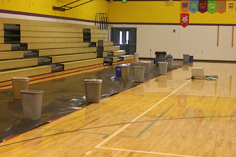 &lt;p&gt;Photo by Erik Fink Part of the Sunnyside Elementary gymnasium floor is covered by a tarp to stop rain damage.&lt;/p&gt;