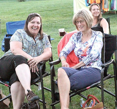 &lt;p&gt;Teri Kelly, left, and Sue Hjort enjoy an evening of blues during the eighth annual Riverfront Blues Festival Friday. (Paul Sievers/The Western News)&lt;/p&gt;