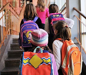 Doctors of chiropractic deal with backpacks' consequences.