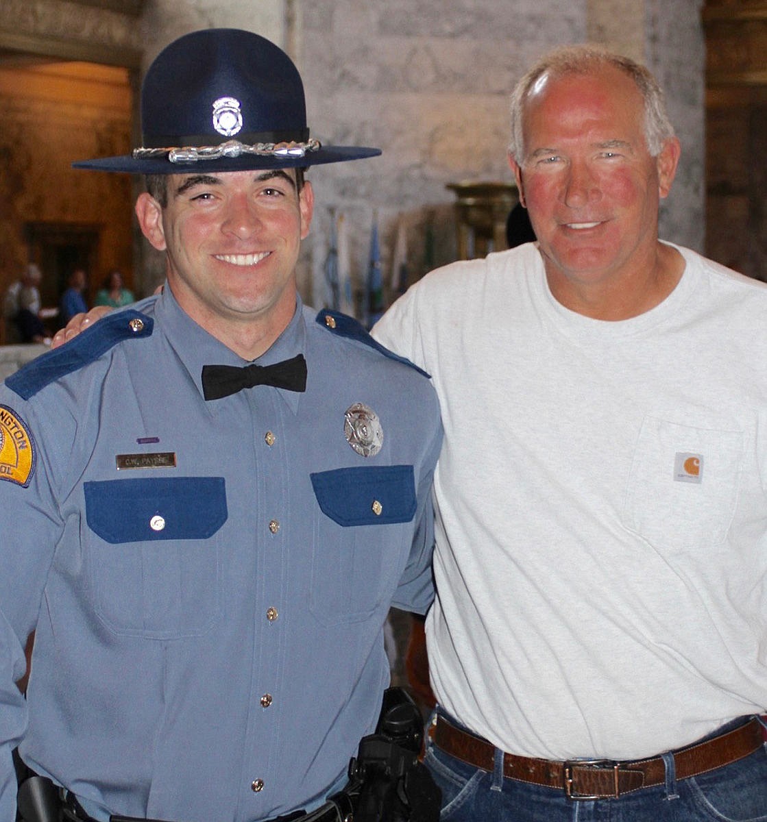 Brand new Washington State Patrol Trooper Connor W. Paysse with his proud father, Bill. His mother, Stacey, died of cancer in 2013. I think she'd still be proud, he said.