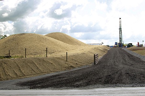 &lt;p&gt;in this June 25 file photo, a crew works on a drilling rig at a well site for shale based natural gas in Zelienople, Pa. In a surprising turnaround, the amount of carbon dioxide being released into the atmosphere in the U.S. has fallen dramatically to its lowest level in 20 years.&lt;/p&gt;