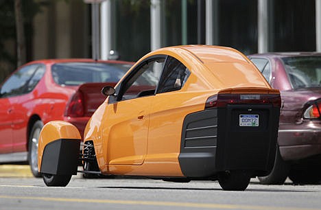 &lt;p&gt;The Elio, a three-wheeled prototype vehicle, is shown in traffic in Royal Oak, Mich., on Thursday. Instead of spending $20,000 on a new car, Paul Elio is offering commuters a cheaper option to drive to work. His three-wheeled vehicle The Elio will sell for $6,800 per car and can save on gas, with a fuel economy of 84 mpg. The Elio, a three-wheeled prototype vehicle, is shown in traffic in Royal Oak, Mich., on Thursday. Instead of spending $20,000 on a new car, Paul Elio is offering commuters a cheaper option to drive to work. His three-wheeled vehicle The Elio will sell for $6,800 per car and can save on gas, with a fuel economy of 84 mpg.&lt;/p&gt;