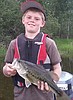 Young kid catches old bass