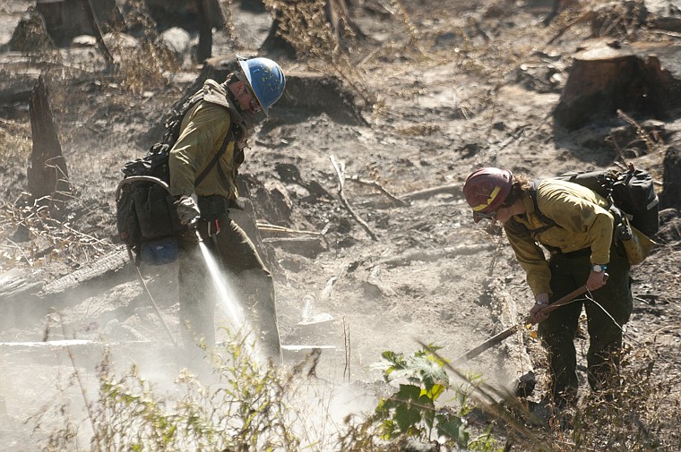 &lt;p&gt;Firefighters tackle hot spots on the South Fork Lost Creek
Fire.&lt;/p&gt;