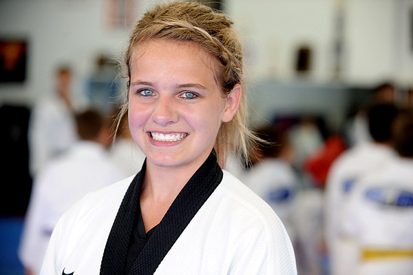 <p>Cassidy Meade smiles during a break from her training at Big Sky Martial Arts.</p>