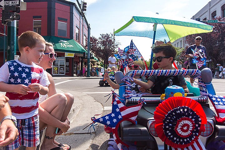 &lt;p&gt;Damon Mysse, left and sister Scarlett hand candy to Cody Burrill during the annual Kids Parade down Sherman Ave. on Friday morning. This years theme was Celebrating Rock and Roll.&lt;/p&gt;