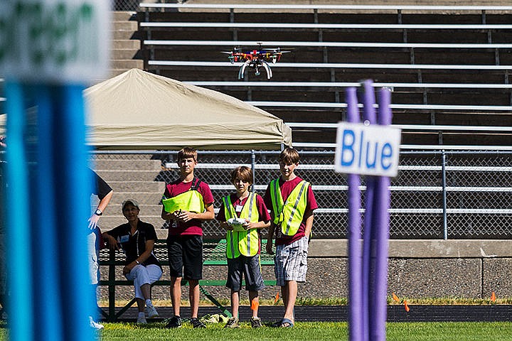 &lt;p&gt;Pierce Duncan, center, operates a quad copter as teammates Zane Chalich, left, and Justin Roberts watch during the Discover Technology Camp Thursday at North Idaho STEM Academy in Rathdrum.&lt;/p&gt;