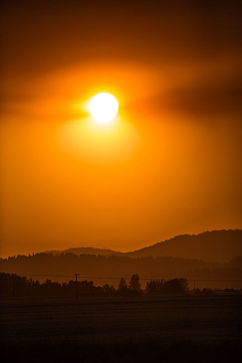 &lt;p&gt;Smoke in the sky creates a red sunset over the Rathdrum Prairie Friday evening.&lt;/p&gt;