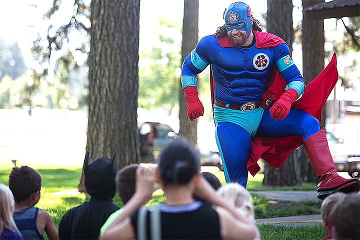 &lt;p&gt;Recycle Man dances for a group of kids upon his entrance prior to his educational and interactive presentation. The Post Falls Library features activities and events that represent heroes in the community, such as firefighters and military veterans.&lt;/p&gt;