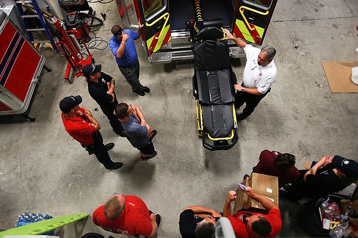 &lt;p&gt;Paramedics from around the Coeur d&#146;Alene area receive loading cot instruction from Kootenai County EMS Devision Chief Bill Keeley Wednesday at Kootenai County Medical Services in Coeur d&#146;Alene. Kootenai County EMS recently replaced their older ambulances with new more efficient vehicles.&lt;/p&gt;