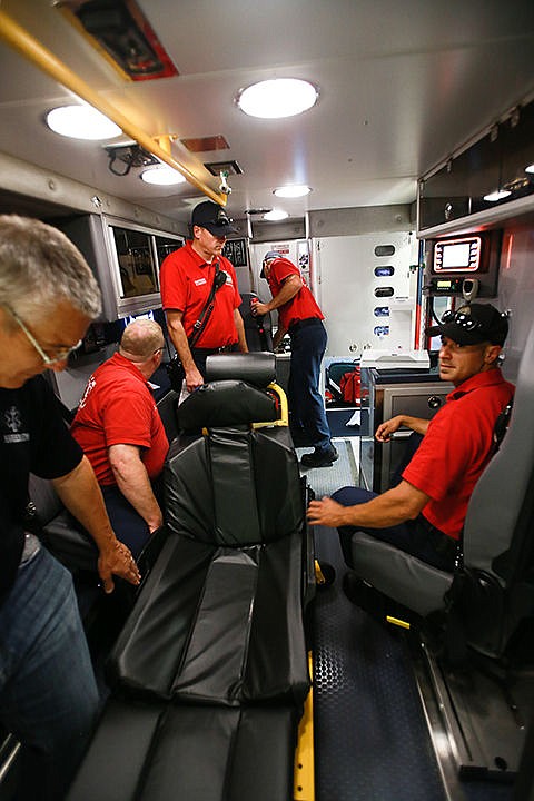 &lt;p&gt;Paramedics from Kootenai County check out the interior of one new ambulance Wednesday. The rigs are 20 inches longer, have a more secure loading cot, and 3 seats with straps for more room and efficiency.&lt;/p&gt;