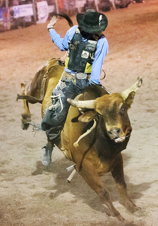 <p>Parker Breding of Edgar won the bull riding competition with a score of 91 on Saturday night during the final session of the Northwest Montana Fair PRCA Rodeo at the Flathead County Fairgrounds. (Patrick Cote/Daily Inter Lake)</p>