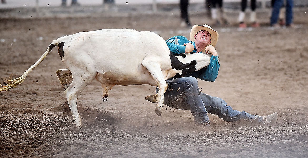 &lt;p&gt;Ty Erickson, of Helena, wrestles his steer in 4.3 seconds on Thursday, August 20, 2015 at the Northwest Montana Fair Rodeo. (Brenda Ahearn/Daily Inter Lake)&lt;/p&gt;