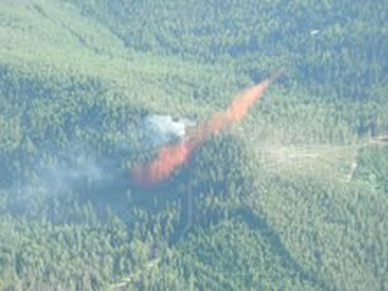 &lt;p&gt;The SEAT (single engine air tanker) pours orange fire suppressant on the Charlie Miller Fire, located just outside of Superior.&#160;&lt;/p&gt;