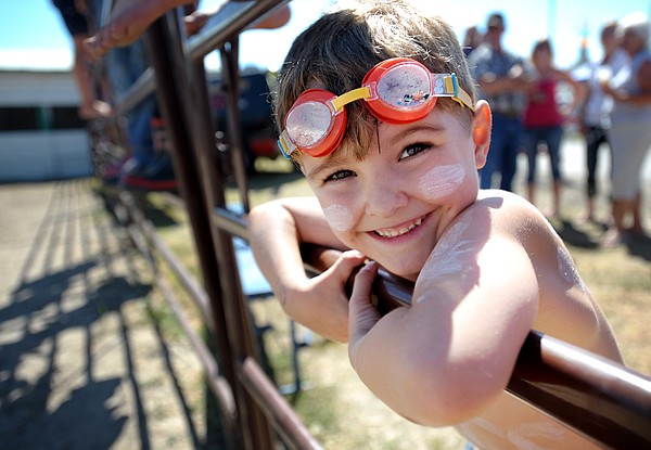 &lt;p&gt;John Nelson, 5, one of the Scuba Pigs waits at the gate for the start of the Pig Wrestling competition at the Northwest Montana Fair on Friday, August 16, in Kalispell.&lt;/p&gt;