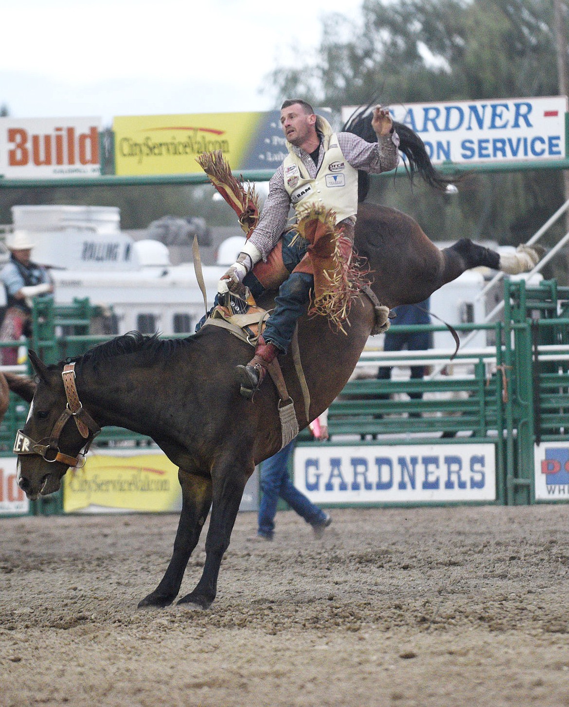 <p>Teddy Athan holds on as Mile Away bucks during the bareback riding at the Northwest Montana Fair Rodeo on Thursday. (Aaric Bryan/Daily Inter Lake)</p>