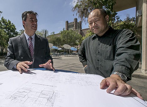 &lt;p&gt;Christos Chrysiliou, left, director of architectural and engineering, Los Angeles Unified School District, LAUSD, and Peter Yee, senior project manager, check a Division of the State Architect submittal plan for the mechanical room to be retrofitted at John Marshall High School in Los Angeles, Aug. 7.&#160;&lt;/p&gt;