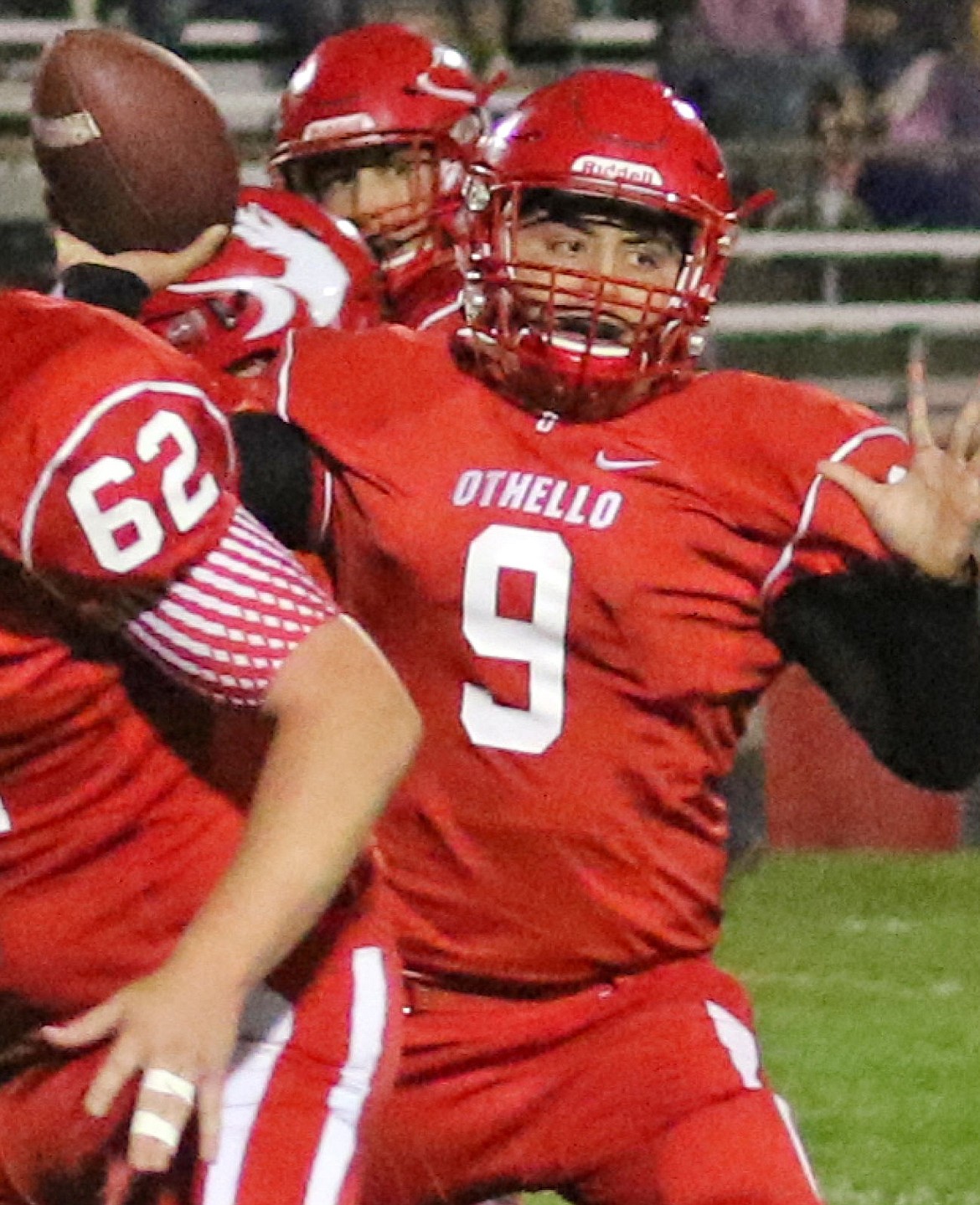 Othello quarterback DJ Guzman throws a quick pass against the Grandview Greyhounds.