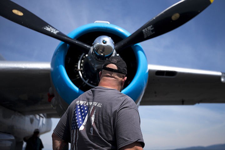 &lt;p&gt;Rick Linscott checks out a prop on the 1944 &quot;Maid in the Shade&quot; B-25 war plane on Thursday, Aug. 18, 2016 at the Coeur d'Alene Airport, where it'll be throughout the weekend. With a 67.5 foot wingspan and a length of 52 feet, 11 inches, the war plane has a top speed of 275 miles-per-hour and can carry a crew of six. The plane flew 15 combat missions over Italy in late 1944, mostly targeting railway bridges.&lt;/p&gt;