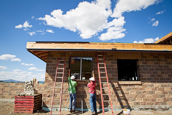 &lt;p&gt;SHAWN GUST/Press Project engineers with Guho Corp., John Carr, left, and Jason Roberts, install a window in the future home of the Idaho Department of Labor Monday during construction. The building, that began in the spring, is slated to be completed by October 26 of this year.&lt;/p&gt;
