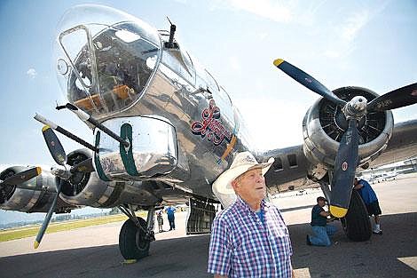 Joe Yates, 86, of Whitefish stands next to a B-17 bomber, &#147;Sentimental Journey,&#148; last month. Yates was a bombardier on a B-17 during World War II. &#147;That was my office,&#148; he says, referring to the nose of the plane. Kristine Paulsen photos/Daily Inter Lake