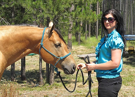 &lt;p&gt;This photo taken Aug. 7 shows Sara Weaver at her horse at her ranch outside Kalispell, Mont. Weaver has finally forgiven the federal agents who 20 years ago shot her mother and younger brother to death during the siege at Idaho's Ruby Ridge, near Bonners Ferry.&lt;/p&gt;