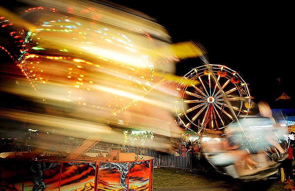 &lt;p&gt;Riders on the Tornado create a blur against the ferris wheel and
the night sky at the Northwest Montana Fair on Thursday in
Kalispell.&lt;/p&gt;