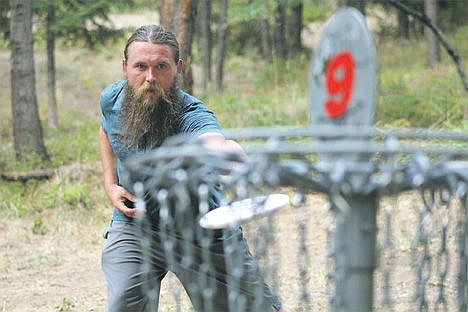 &lt;p&gt;Jared Person sinks a putt during a practice round at Cherry Hill Disc Golf Course. He said he thinks he has one of the best beards in disc golf. &#147;It&#146;s a big one,&#148; Person said. &#147;When it gets to a certain length, you don&#146;t want to trim it. You want to see how far you can take it.&#148;&lt;/p&gt;